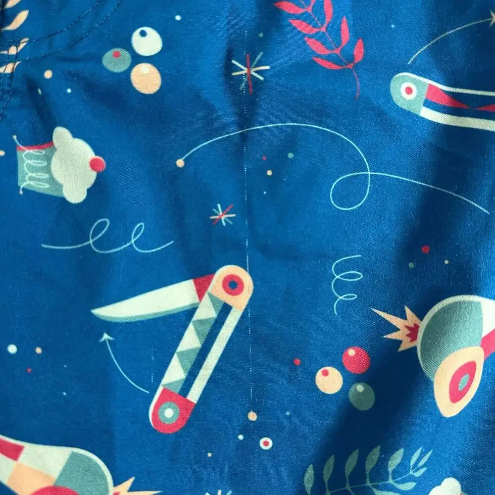 Johnny Cupcakes All-Over Print Cannon and Knife Pattern Swim Boardshorts